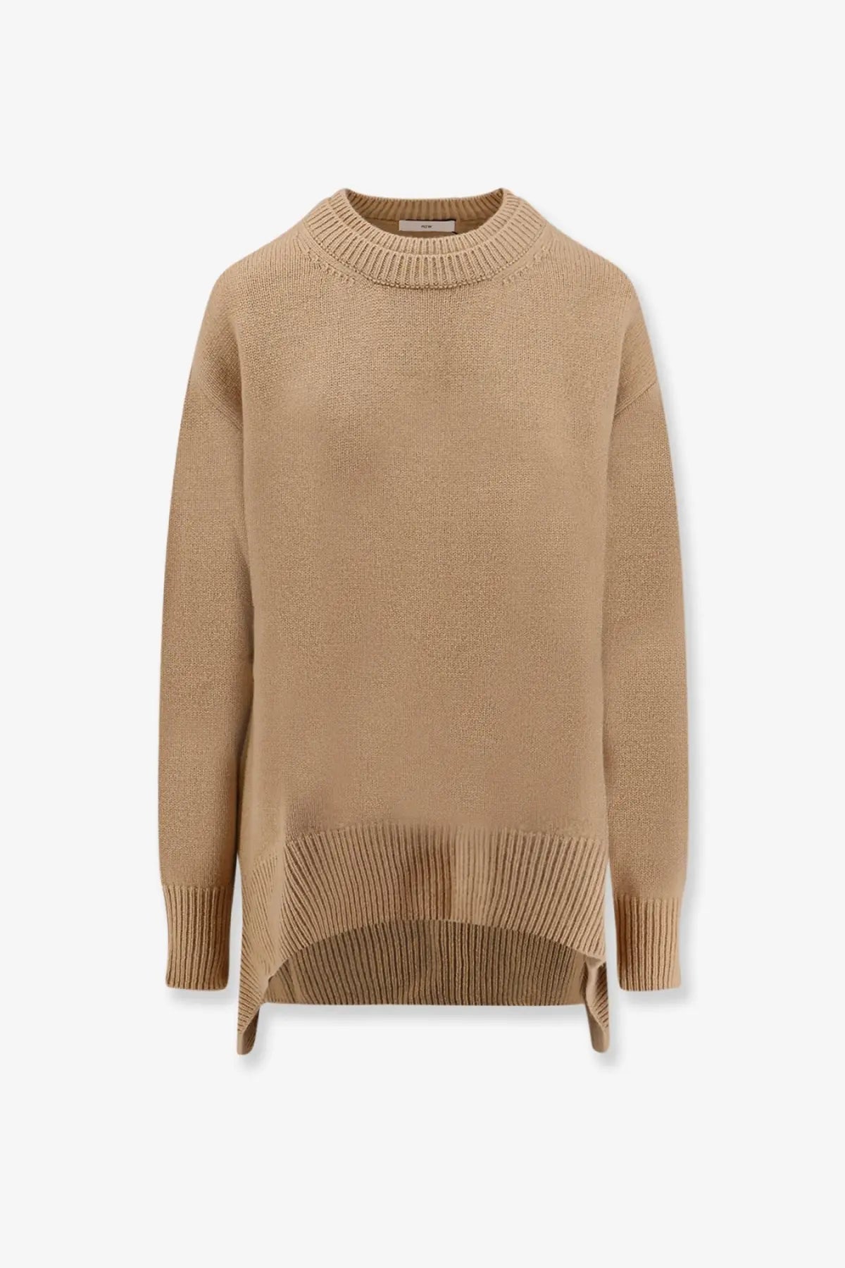 A soft camel-colored oversized knit sweater with ribbed crew neckline and cuffs in wool and cashmere