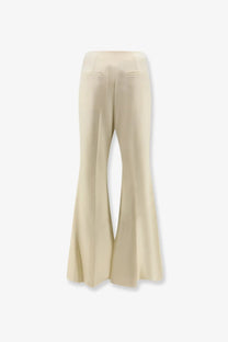 R2W women’s vonnie wool cream wide-leg trousers with flared hem and subtle back pockets shown from the back