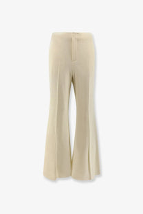 Cream-colored wide-leg vonnie wool trousers for women with smooth flowing fabric and subtle front pleats by rwa