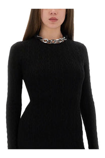 A bold chunky silver chain choker necklace with matte finish and interlocking links paired with rabanne black wool dress