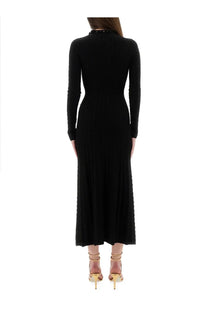 Black long-sleeved knit wool midi dress with high neckline and pleated skirt by Rabanne for women