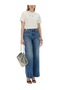 A shimmering silver sequined clutch with thin metallic handles complementing rabanne women’s white shirt