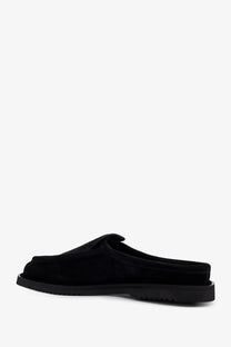 Black suede mule slip-on shoe with a chunky rubber sole from Reference mens the canoa resort suede sabot black collection