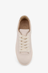 Cream-colored leather low-top sneaker with matching laces and minimalist design in reference mens the cassetta white