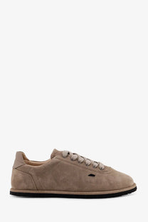 Beige suede low-top Reference men’s The Shamal sneakers with matching laces and black rubber sole shown from the back