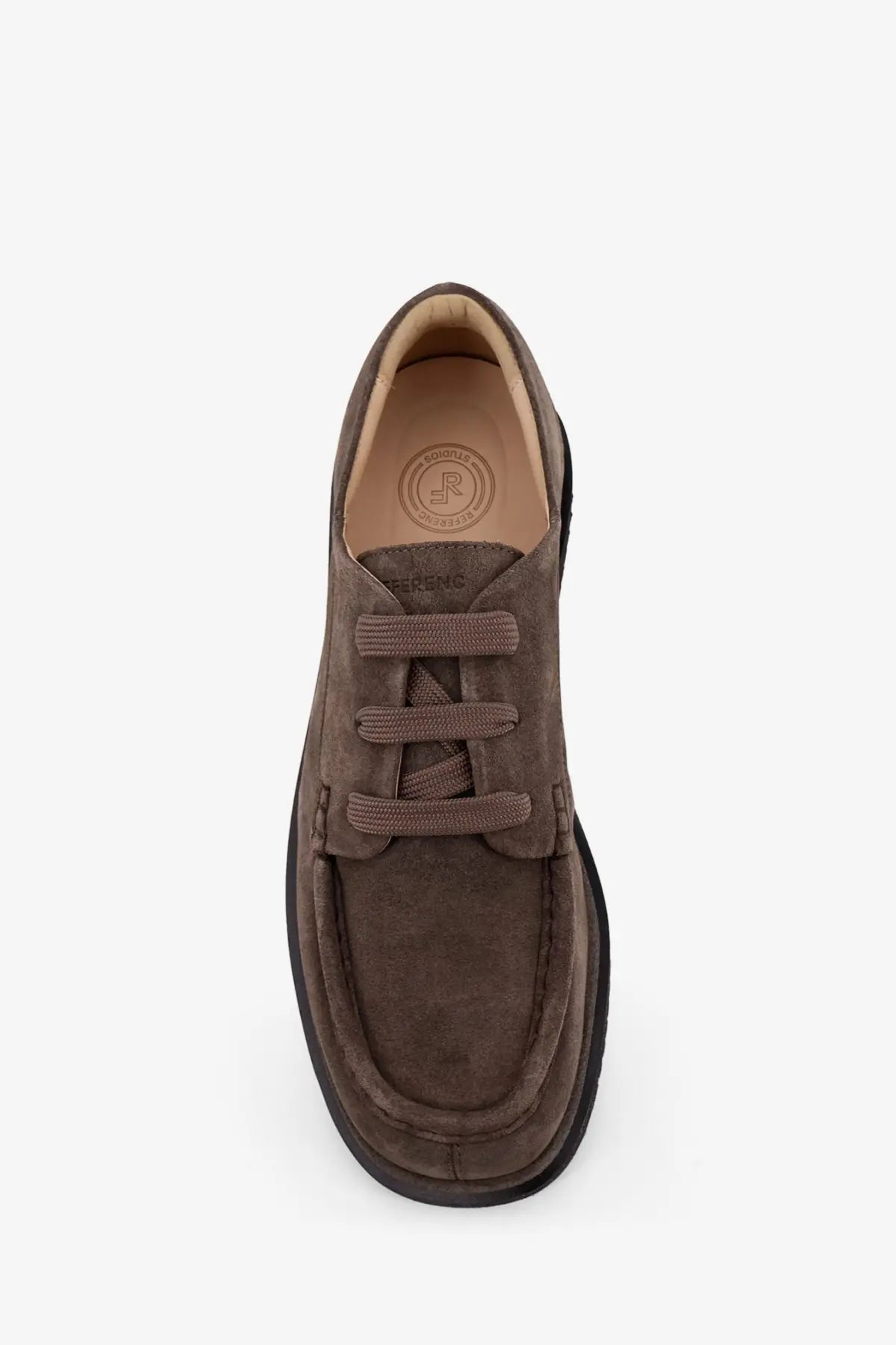 Reference men’s the tahoe resort suede lace beige is a brown suede slip-on shoe with thick black sole and matching laces