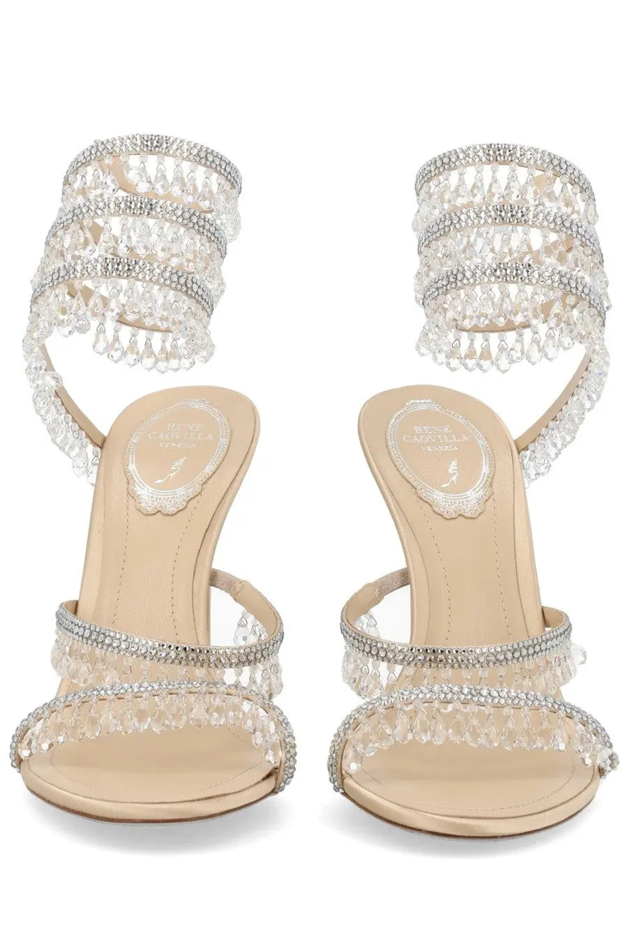 Beige high-heeled sandals by Rene Caovilla featuring sparkling crystal rows and dangling teardrop charms