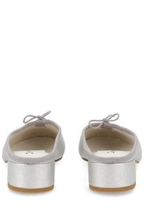Back view of repetto women’s ballerina mule camille silver metallic flats with bow detail at the heel