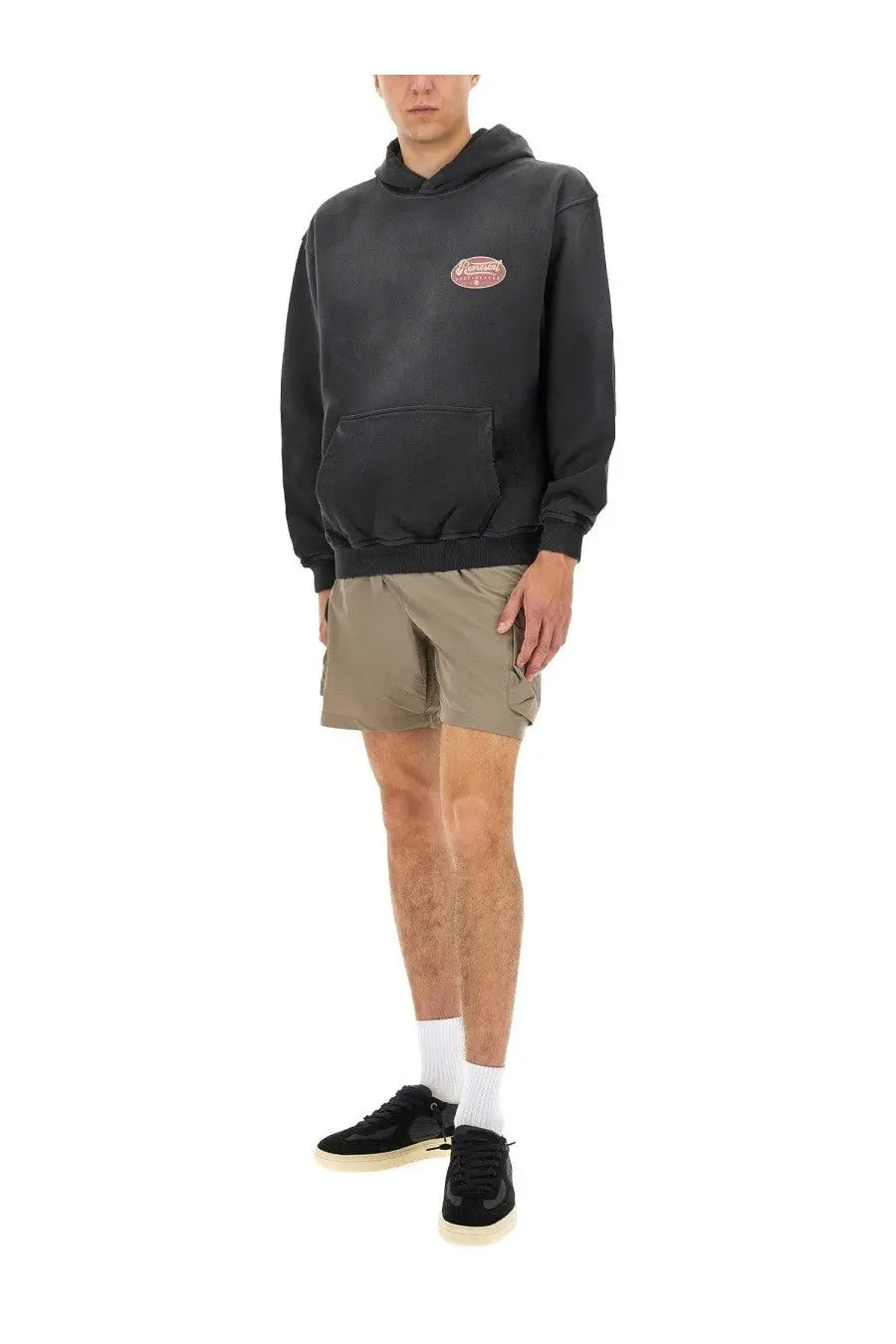Represent men’s black hooded sweatshirt with faded red oval logo on chest made from british luxury materials