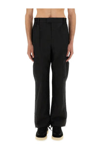 Black cargo pants from represent men’s cargo tech pants featuring a sleek straight-leg cut with prominent side pockets