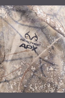 Represent men’s cargo trousers green in Realtree apx camouflage fabric with detailed woodland pattern in earthy browns tans and grays