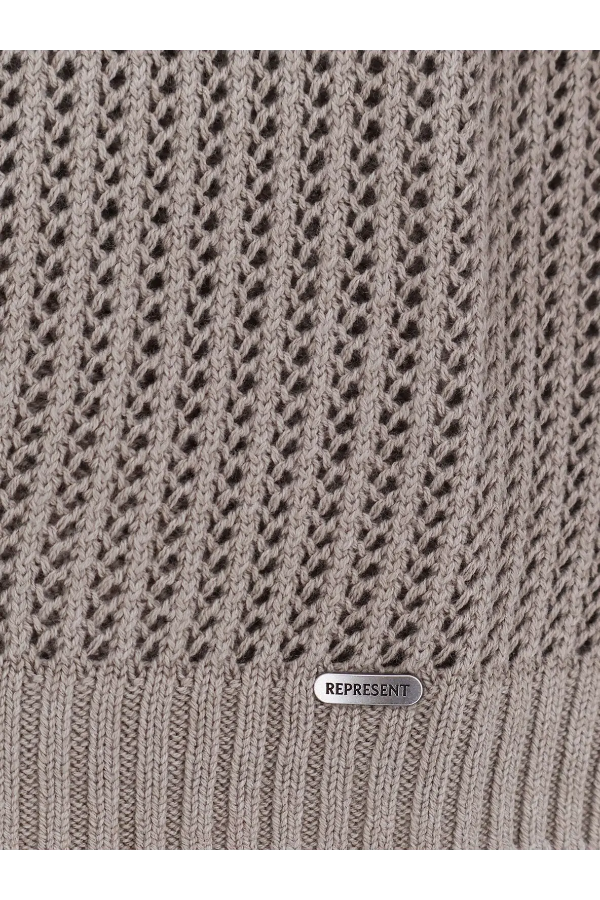Taupe knitted sweater with textured openwork pattern and ribbed hem with silver represent brand tag