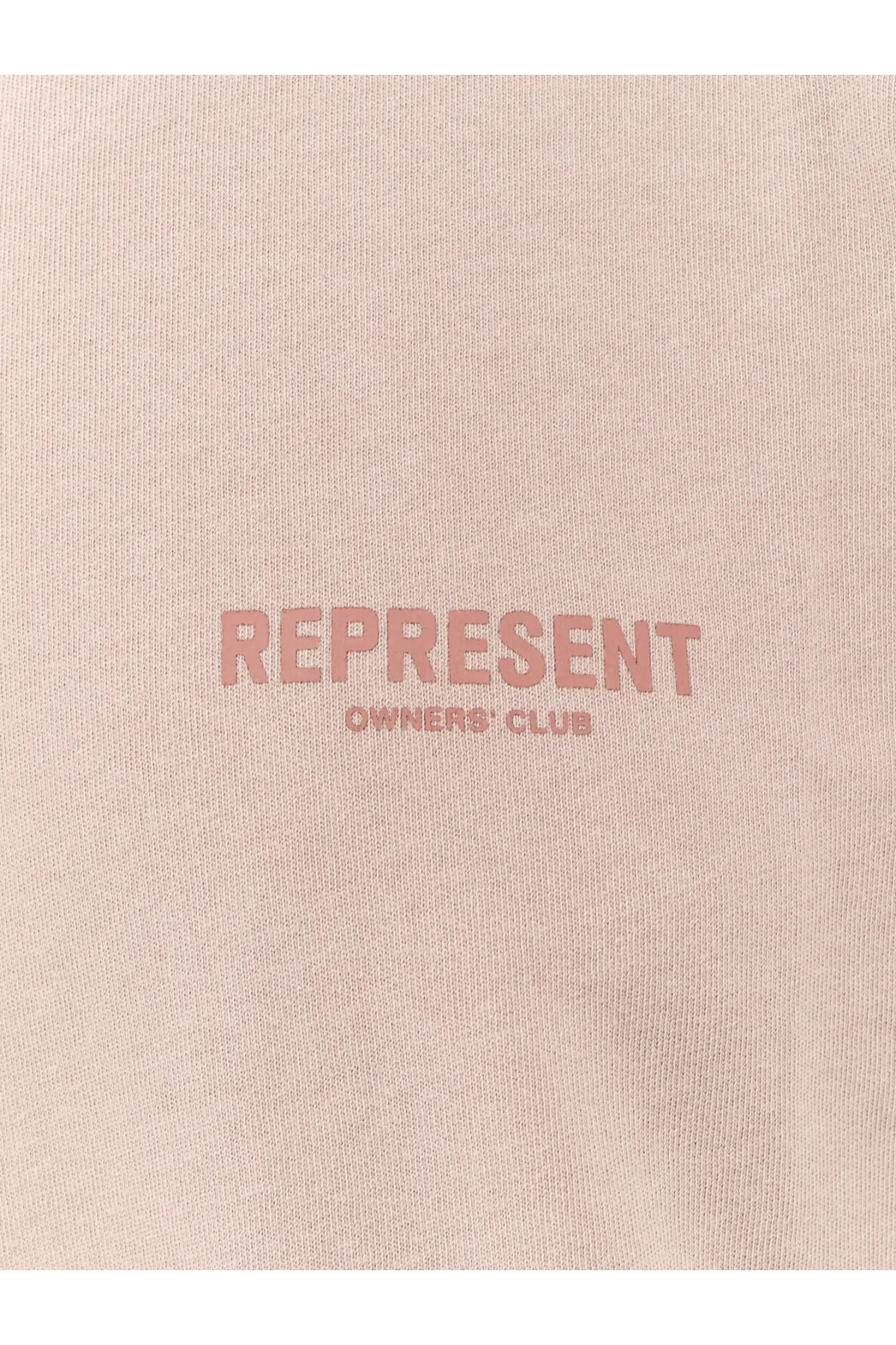 Represent men’s cotton shirt grey featuring a soft blush pink t-shirt with a matching rose-colored logo across the chest