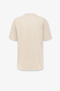 Represent men’s cotton shirt white oversized cream-colored t-shirt with relaxed fit and short sleeves