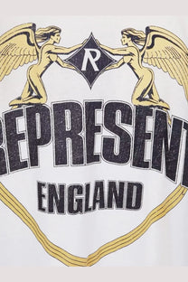 White represent men’s cotton t-shirt with bold black and gold graphic of winged figures and diamond shaped r logo