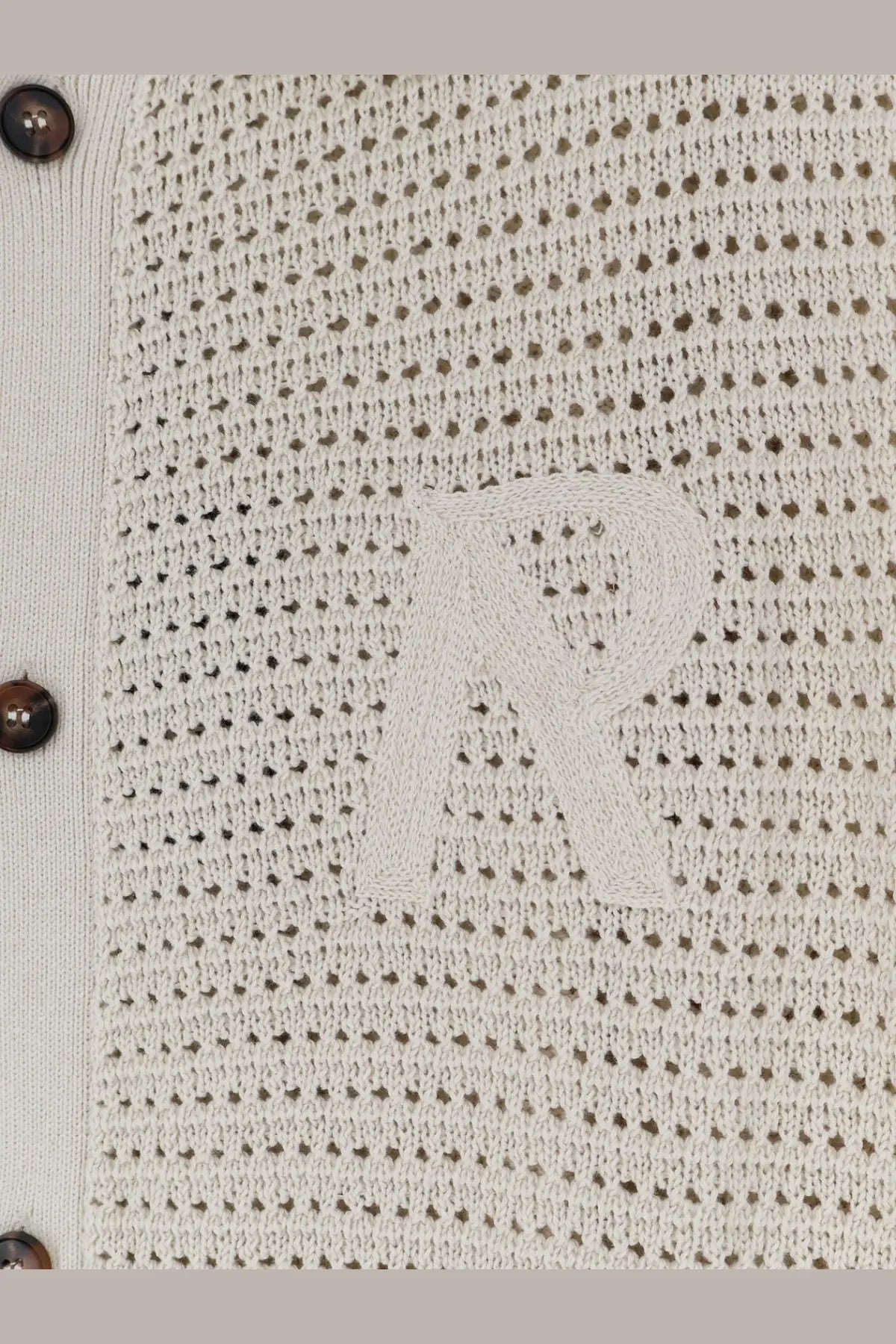 Beige knitted cardigan with perforated texture and embroidered r logo paired with represent men’s pico cotton blend polo shirt white