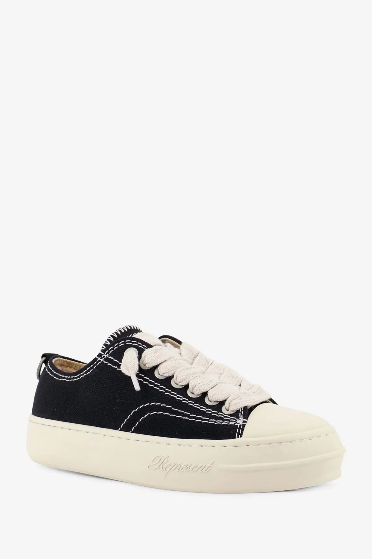 Represent men’s rep cap black low-top canvas sneaker with white laces cream rubber sole and toe cap with stitching details
