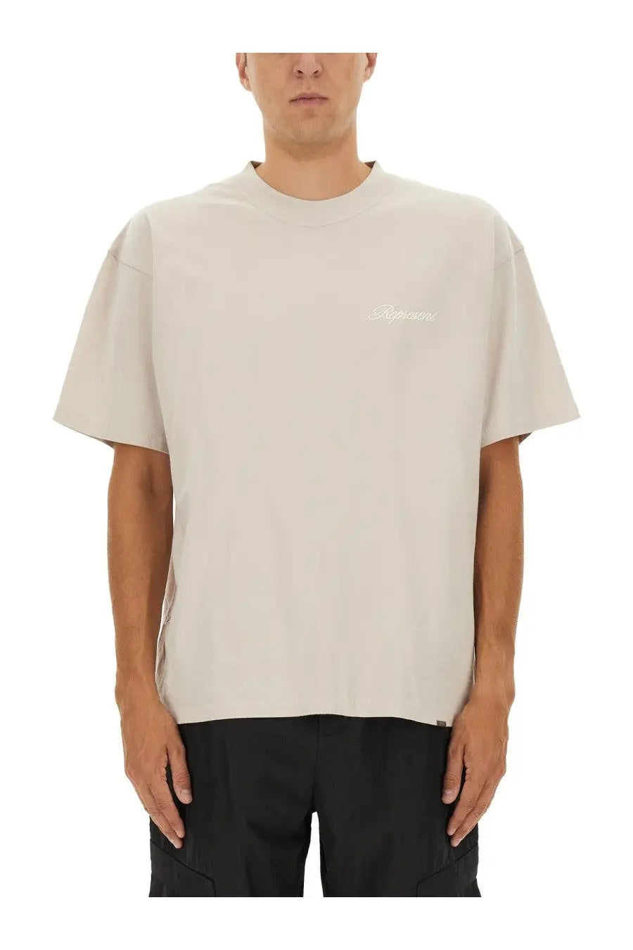 Represent men’s beige short-sleeved crew neck t-shirt with subtle white embroidered logo on left chest