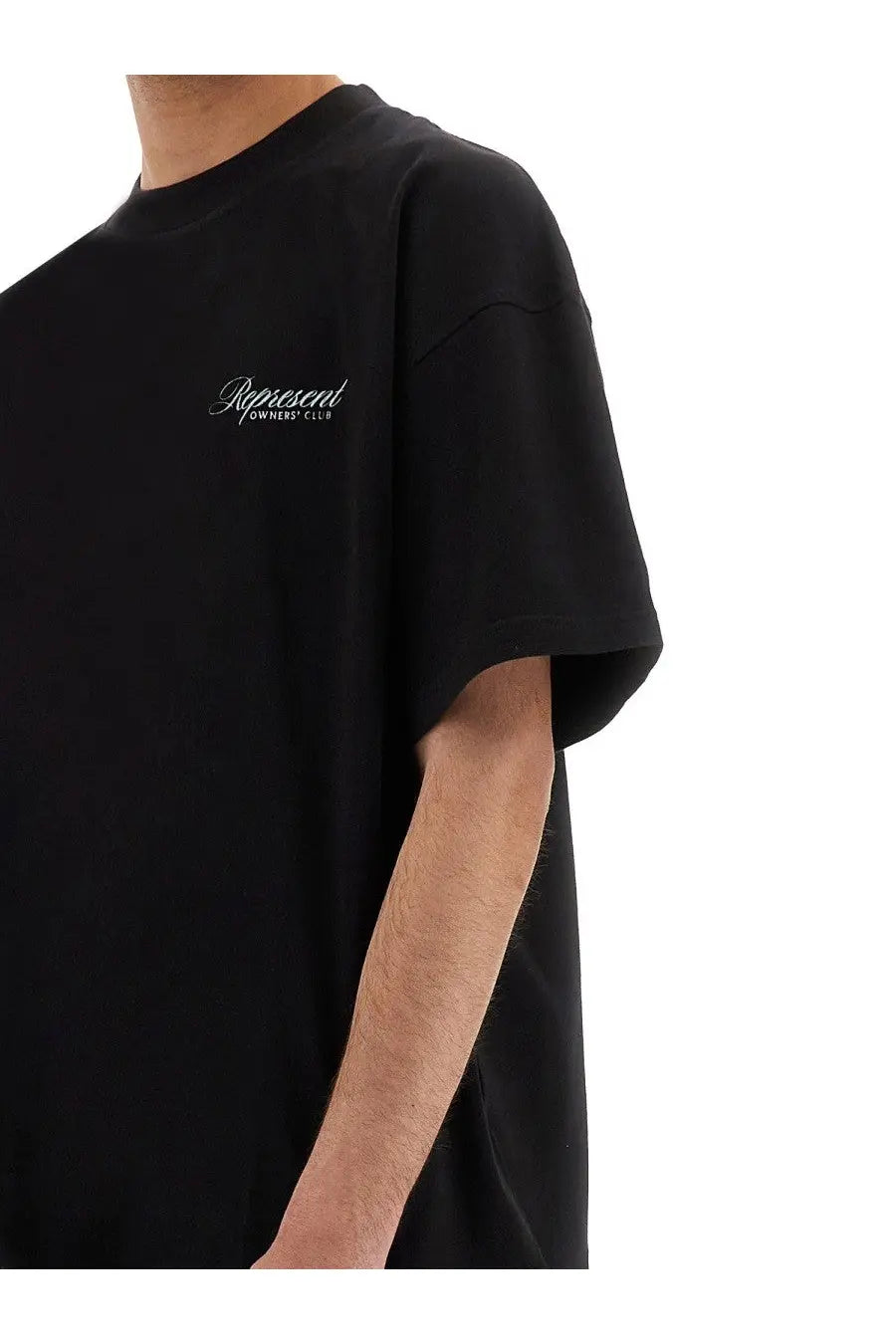 Black oversized represent men’s t-shirt with subtle white cursive represent owners club logo embroidered on left chest