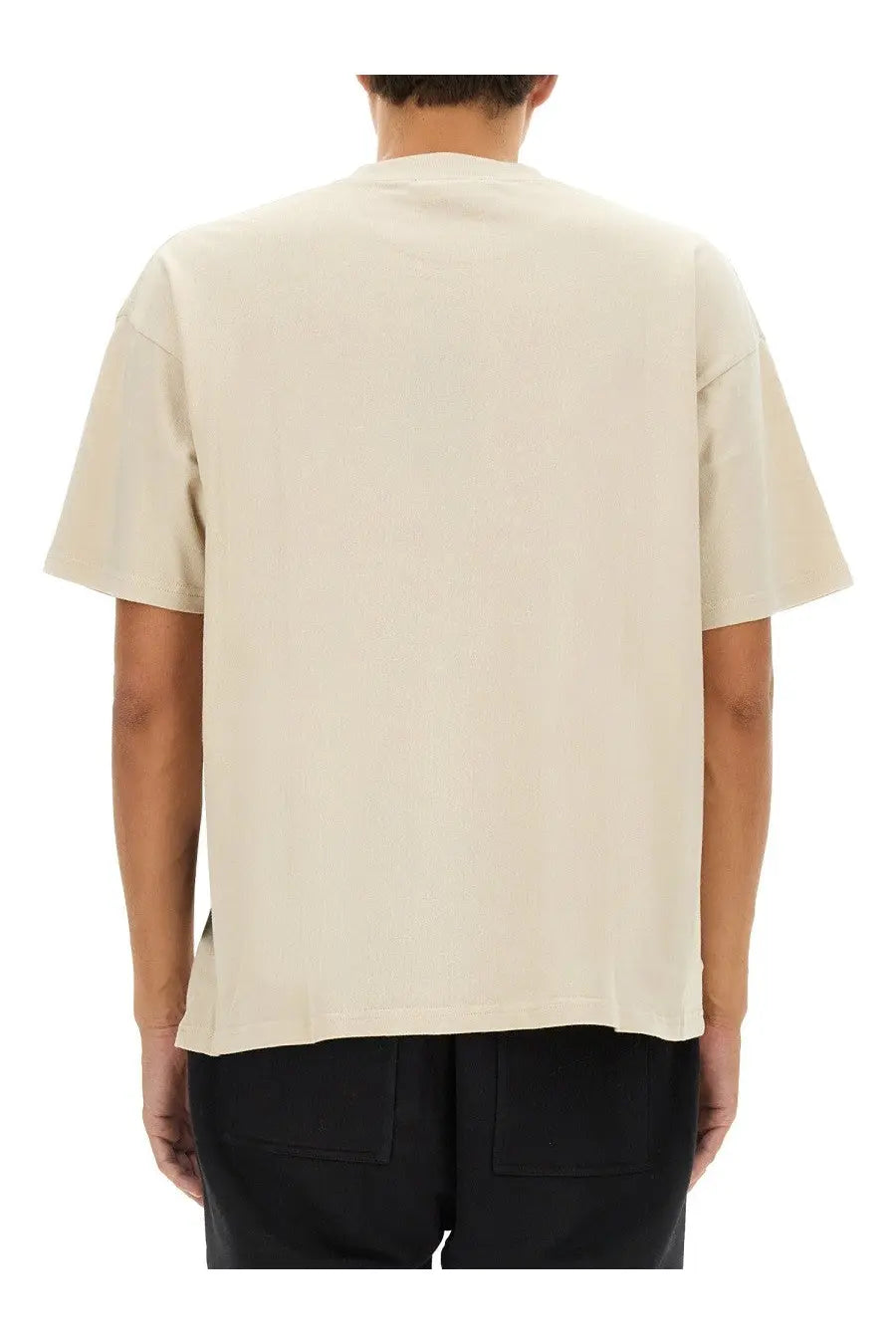 Represent men’s beige oversized short-sleeved shirt with relaxed fit and subtle side seam detailing