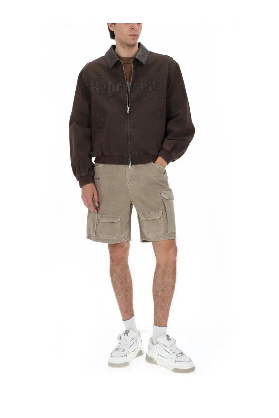 Brown reparation bomber jacket with contrasting dark collar and front zipper paired with beige cargo shorts