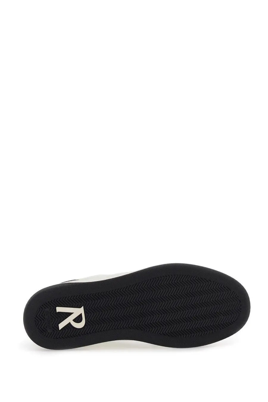 Back view of represent men’s sneaker initial black showing black rubber sole with white r logo on the heel