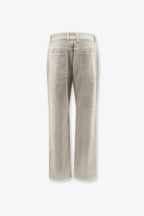Represent men’s velvet trousers green shown from the back with light-wash denim straight-leg jeans and classic pockets