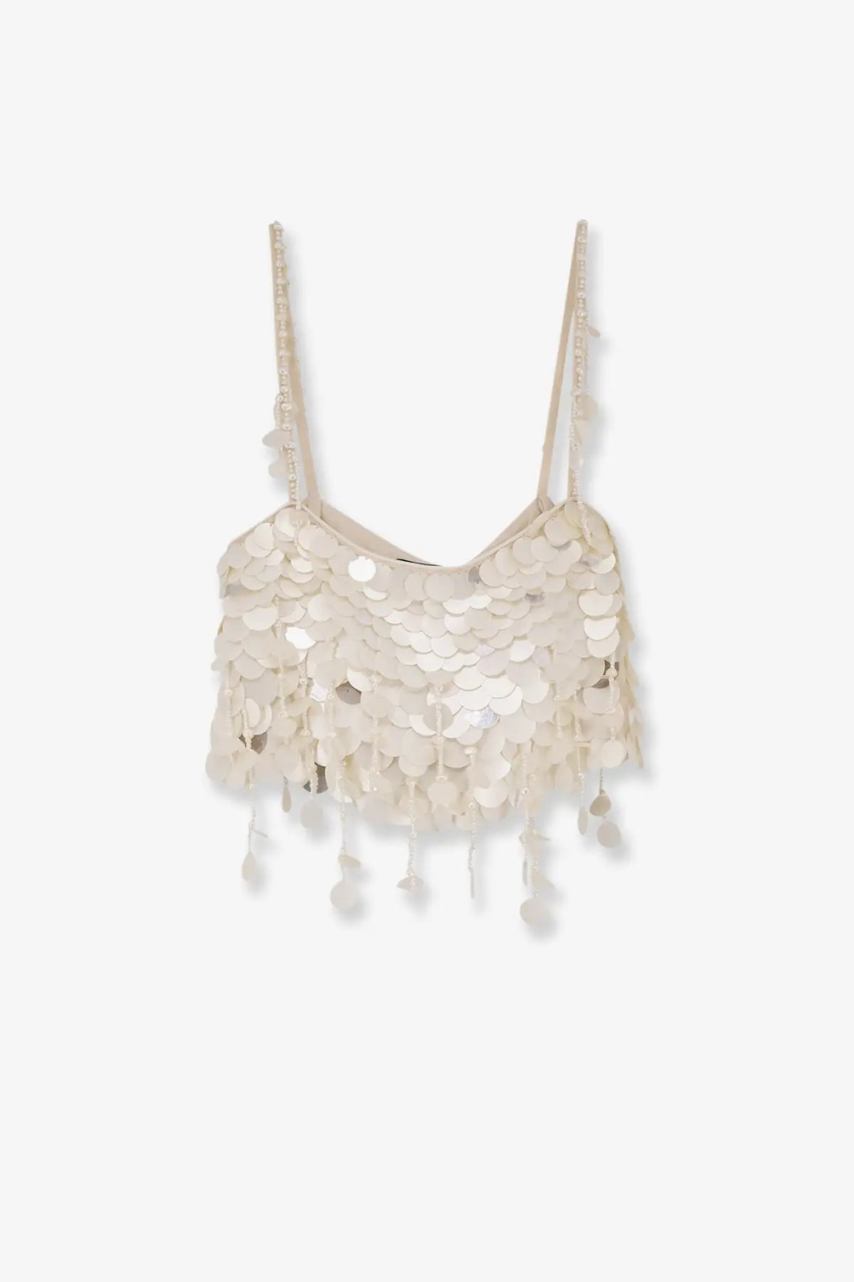 Retrofete women’s Eudora top white is an off-white sequined crop top with spaghetti straps and dangling tassels