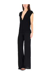 Rick Owens Lilies women’s black sleeveless jumpsuit with deep v-neckline and wide-leg pants in lightweight fabric