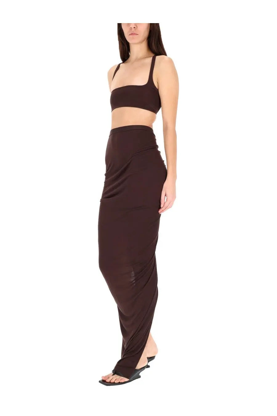 A sleek dark brown high waisted maxi skirt by rick owens lilies featuring a draped asymmetrical design