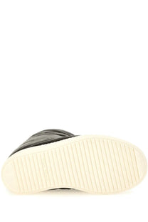 Back view of rick owens men’s boot mega bumper lunar black quilted high-top sneaker with white grooved sole and logo heel