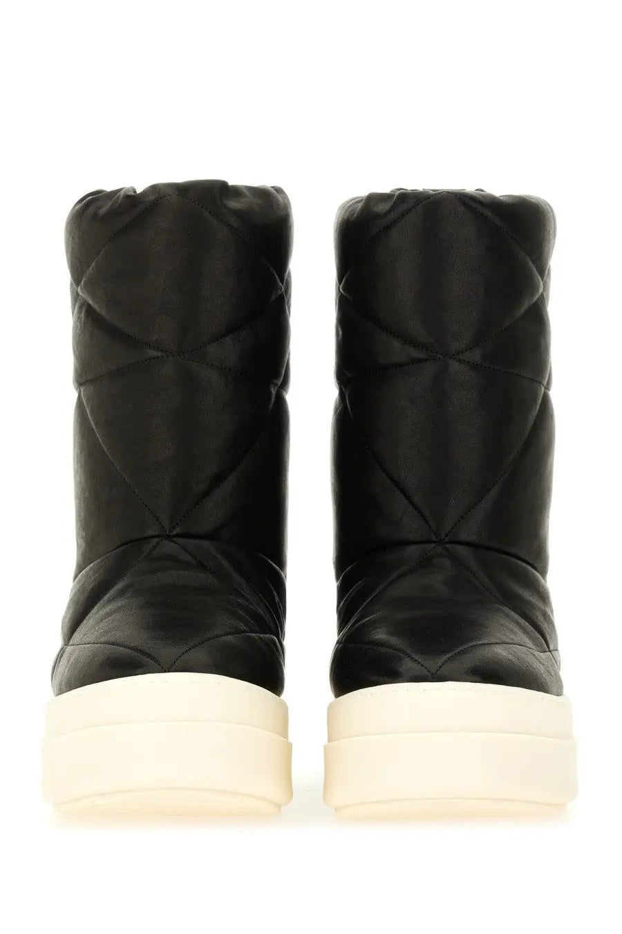 Rick Owens men’s quilted black winter boots with cream platform sole designed for cold weather use