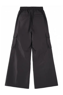Rick Owens men’s black wide-leg cargo pants with elastic waistband and large side pockets in cotton material