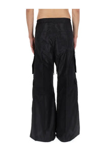 Rick Owens men’s black wide-leg cargo belas pants with shiny lightweight fabric and multiple side pockets
