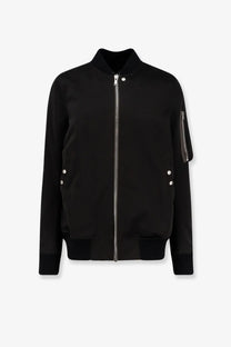 Rick Owens men’s classic flight bomber black jacket with silver zippers and button accents in leather material
