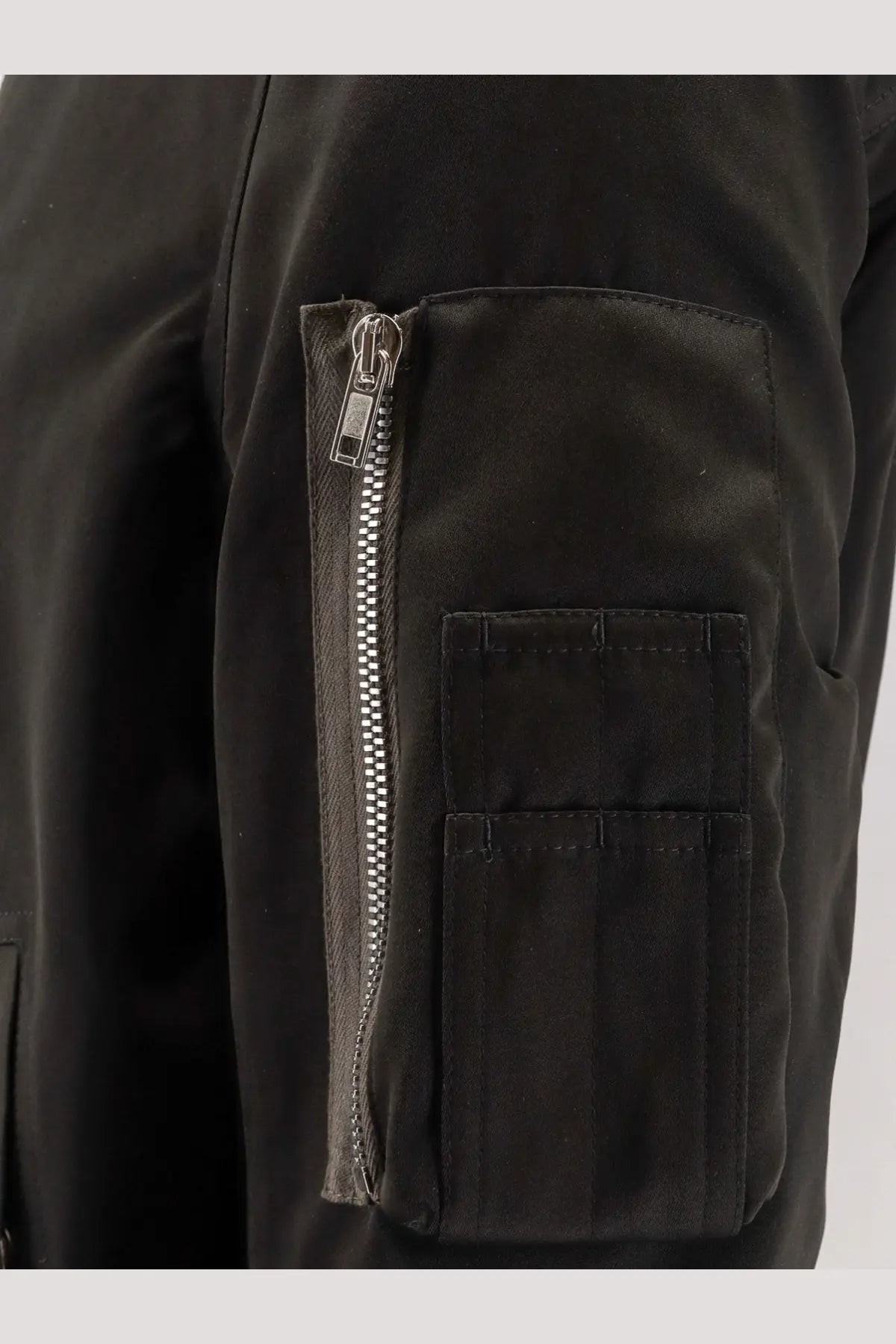 Rick Owens men’s classic flight bomber black jacket featuring a black utility pocket with silver zipper and reinforced stitching
