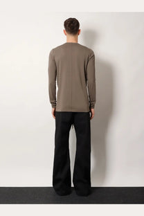 Back view of a minimalist rick owens men’s cotton shirt grey in taupe with a subtle vertical seam down the back