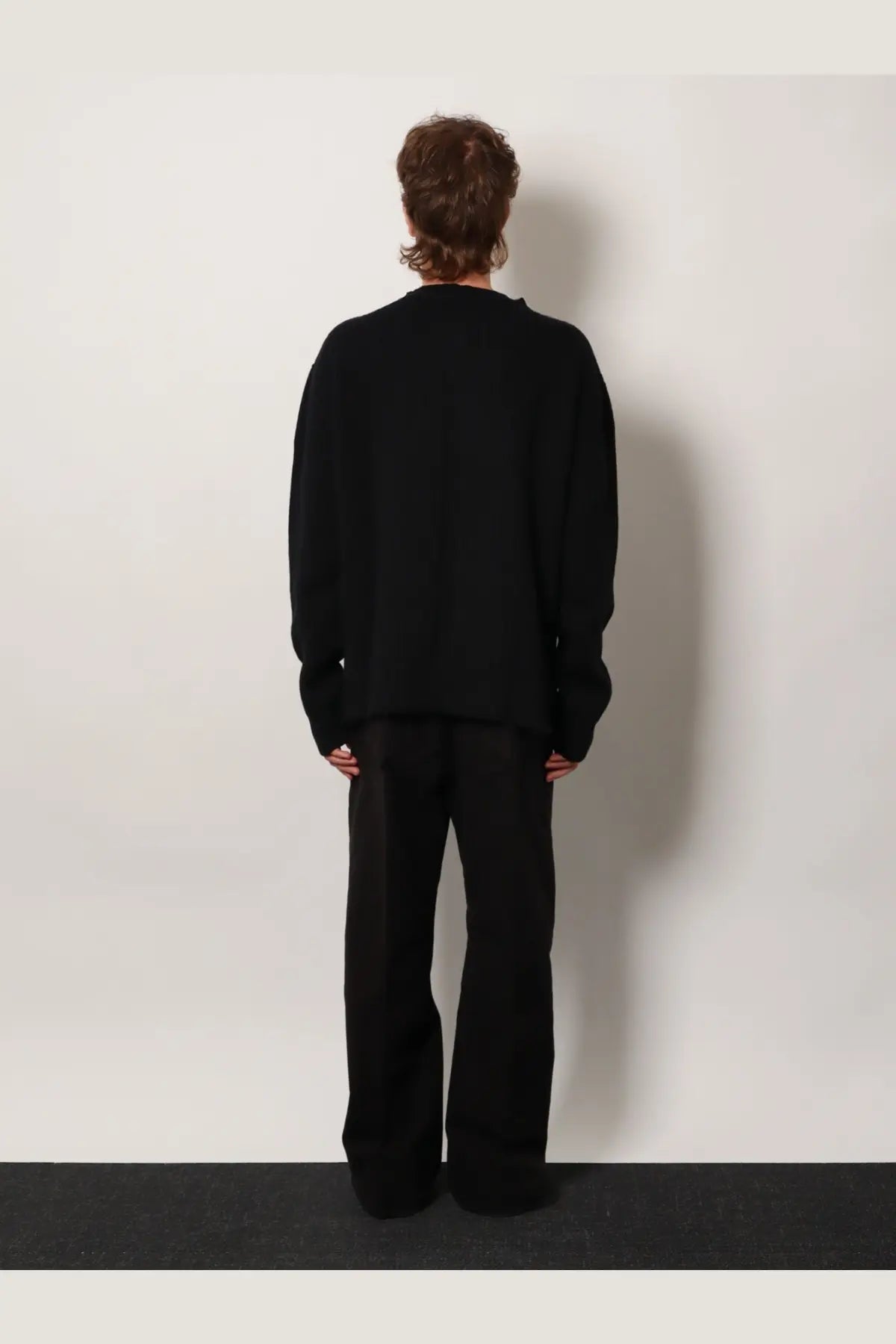 Rick owens men’s black virgin wool sweater with oversized knit, relaxed fit, and long sleeves