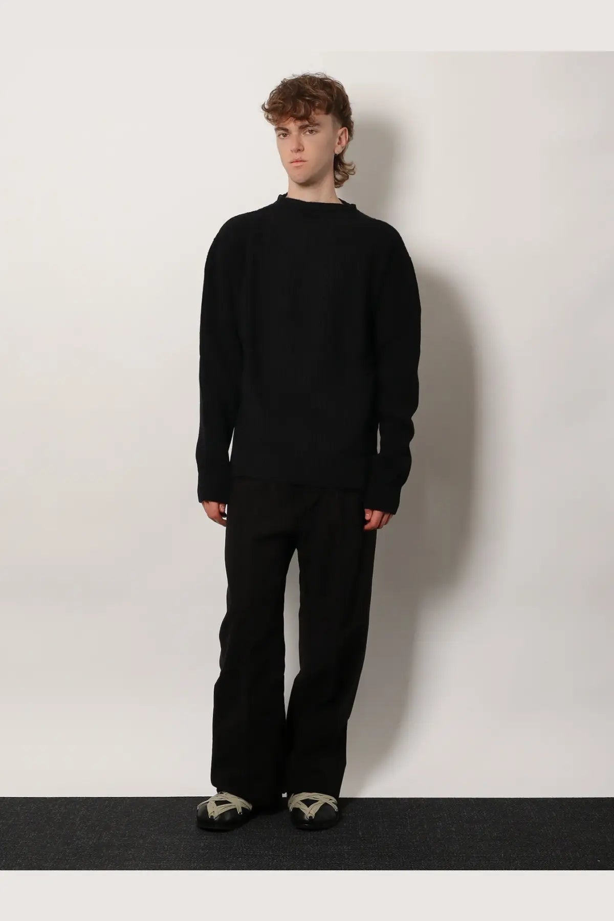 Rick Owens men’s black oversized crewneck sweater in soft textured virgin wool knit fabric