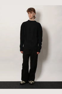 Rick Owens men’s black oversized crewneck sweater in soft textured virgin wool knit fabric