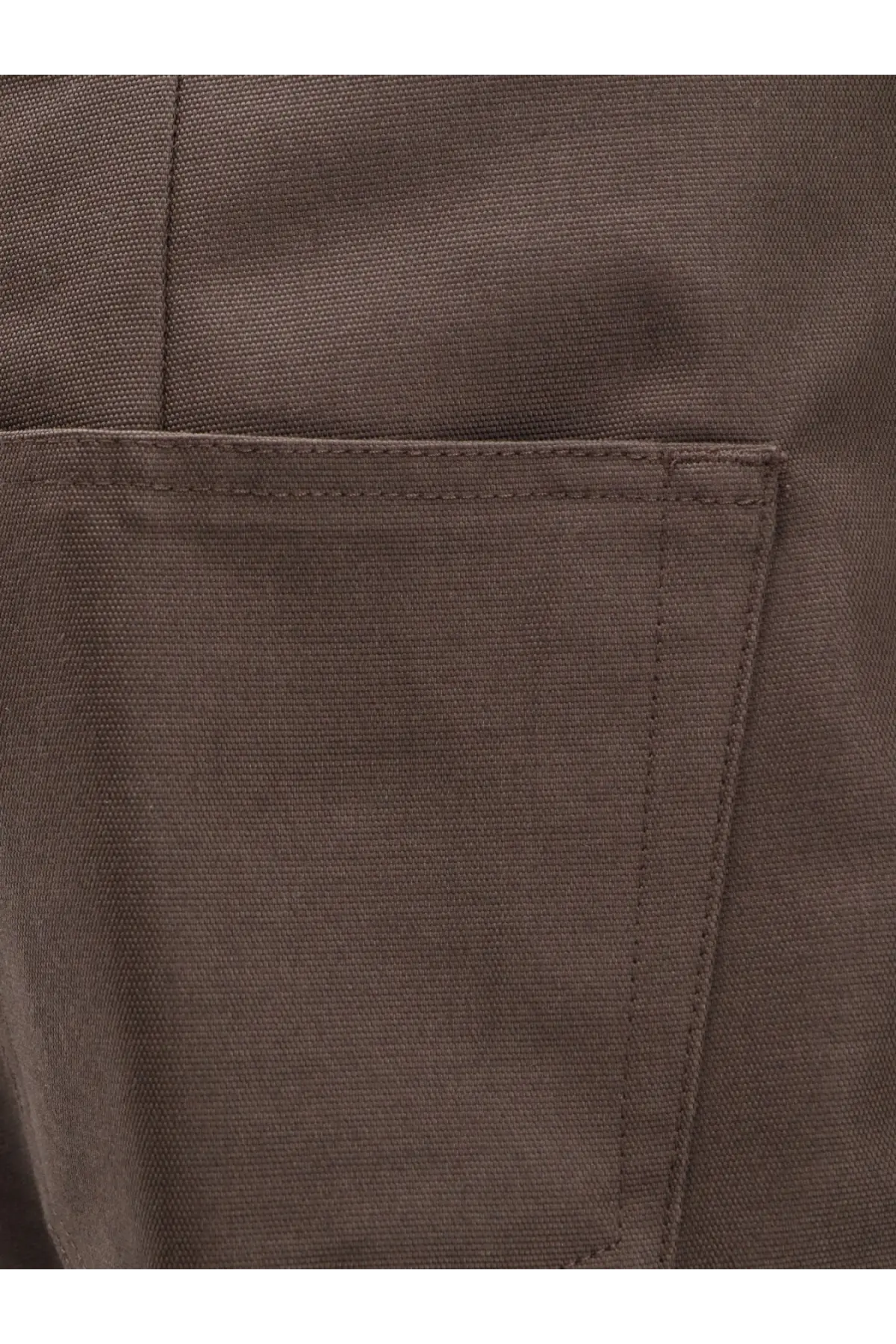 Brown canvas pocket with visible stitching and woven texture on rick owens mens geth recycled grey trousers back side