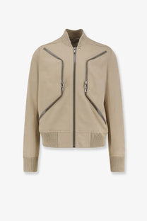Beige leather bomber jacket with ribbed knit collar cuffs hem and diagonal chest zippers by Rick Owens Men’s Heizer Flight