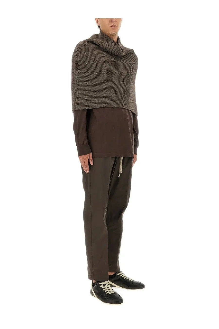 Rick owens men’s knitted cape grey shown with a dark brown ribbed knit cowl neck poncho layered over matching knitwear