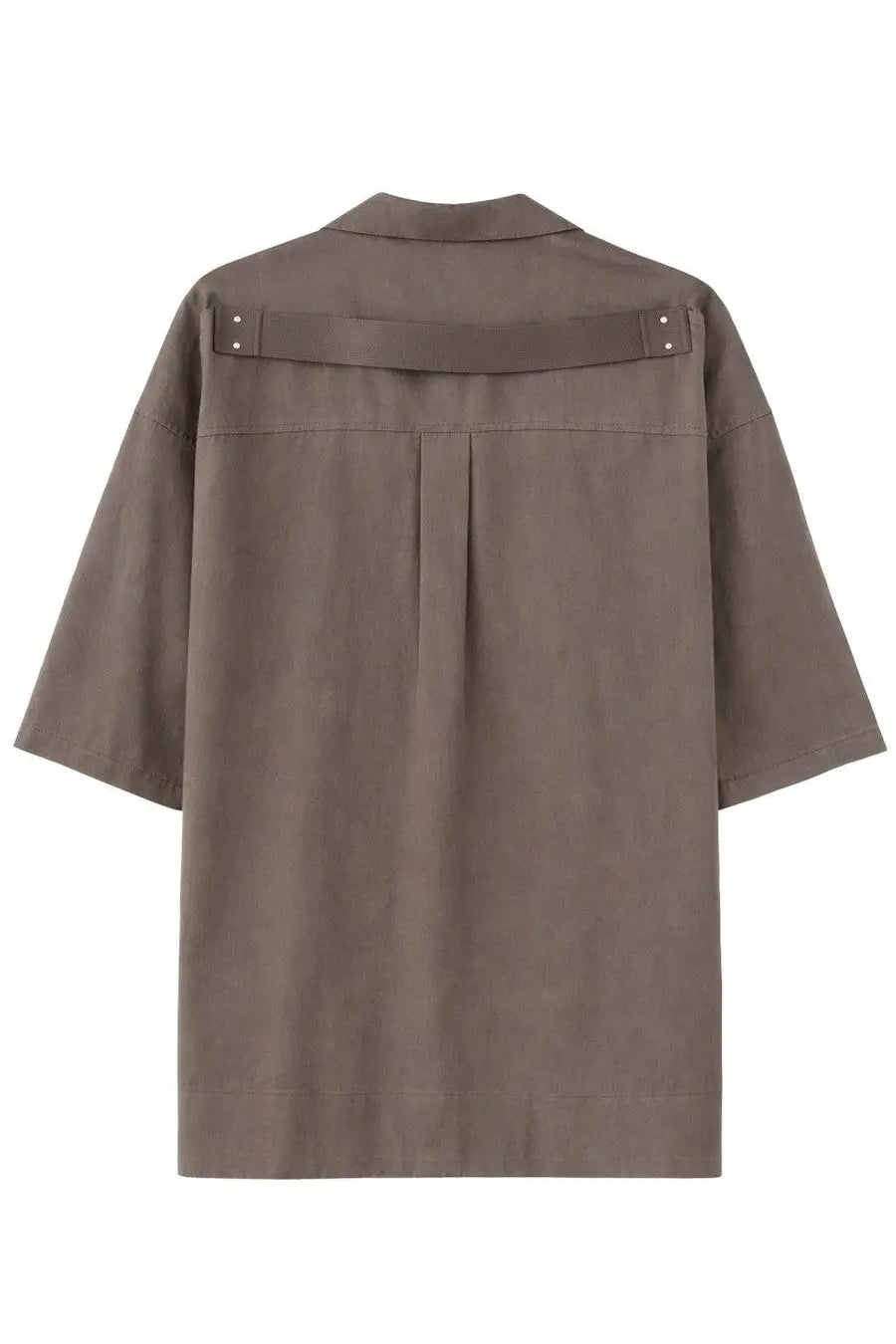 Back view of a taupe grey Rick Owens men’s magnum tommy short-sleeved shirt with structured collar and horizontal back strap
