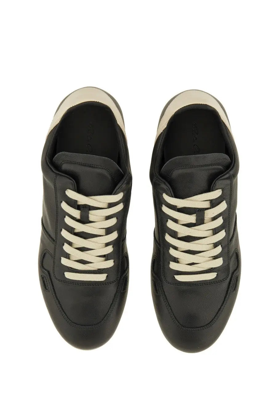 Rick Owens men’s minimal sneak sneaker in black leather with cream laces and matching heel tab shown from the back