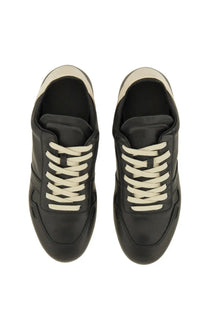 Rick Owens men’s minimal sneak sneaker in black leather with cream laces and matching heel tab shown from the back