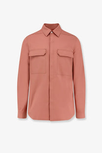 Rick Owens men’s organic cotton shirt in soft terracotta with long sleeves, flap pockets, and classic collar