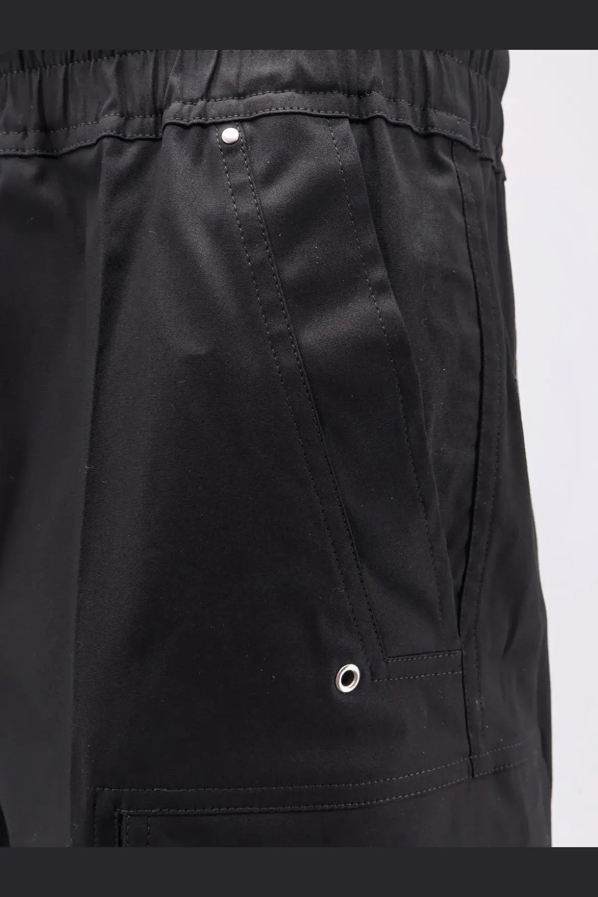 Rick Owens men’s organic cotton black cargo shorts with drawstring waistband and silver metal grommets