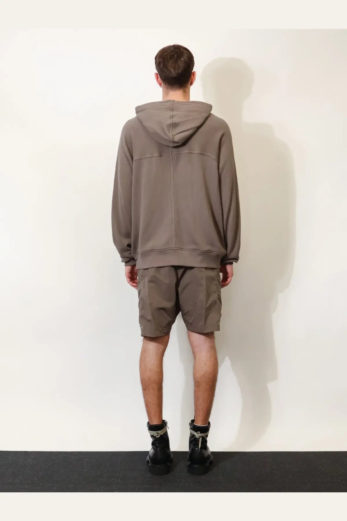 Rick Owens men’s organic cotton sweatshirt in muted olive green with hood relaxed fit and subtle seam detailing
