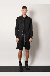 Rick Owens men’s black long-sleeved overshirt with chest pockets and central zipper made from certified cotton